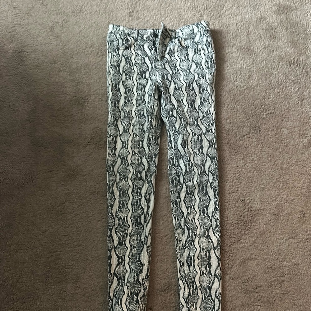 Snake skin skinny jeans